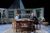 Sthbry-080 Phoebe Nicholls and Alex Jennings sit at a wooden table, they lean toward each other and Phoebe watches Alex intently.